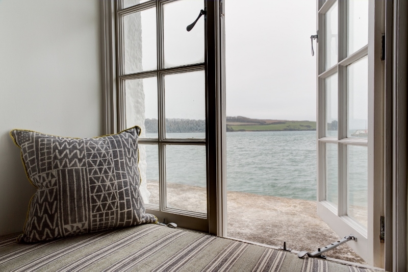 Harbour Room - a view of the sea through the open window at The Idle Rocks Hotel, St Mawes