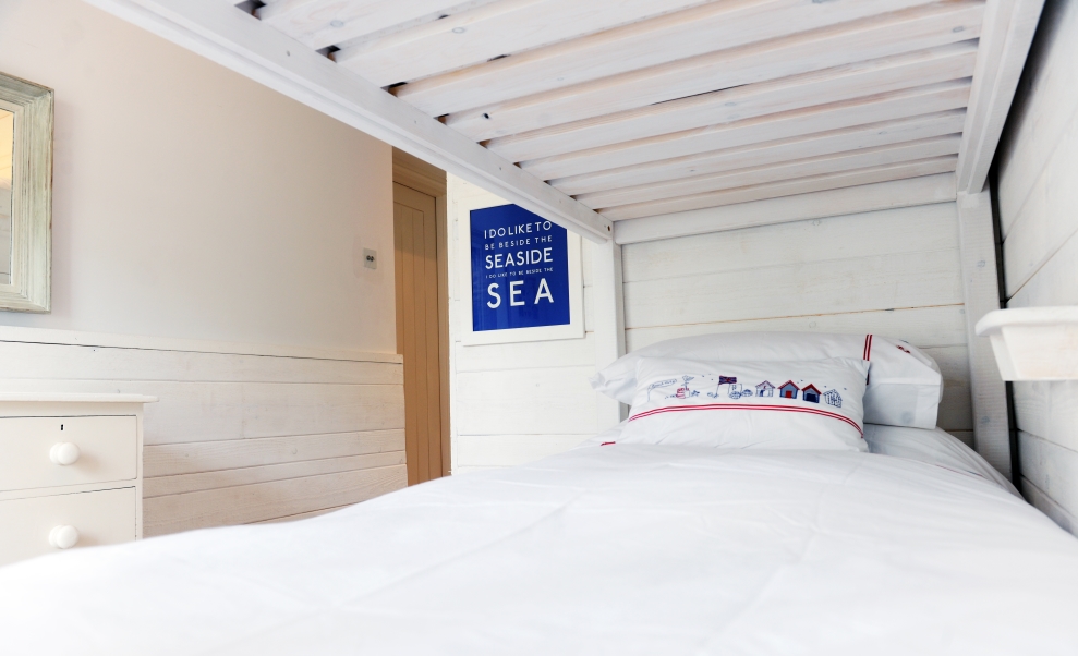 Family Rooms at the Idle Rocks - white bunk beds